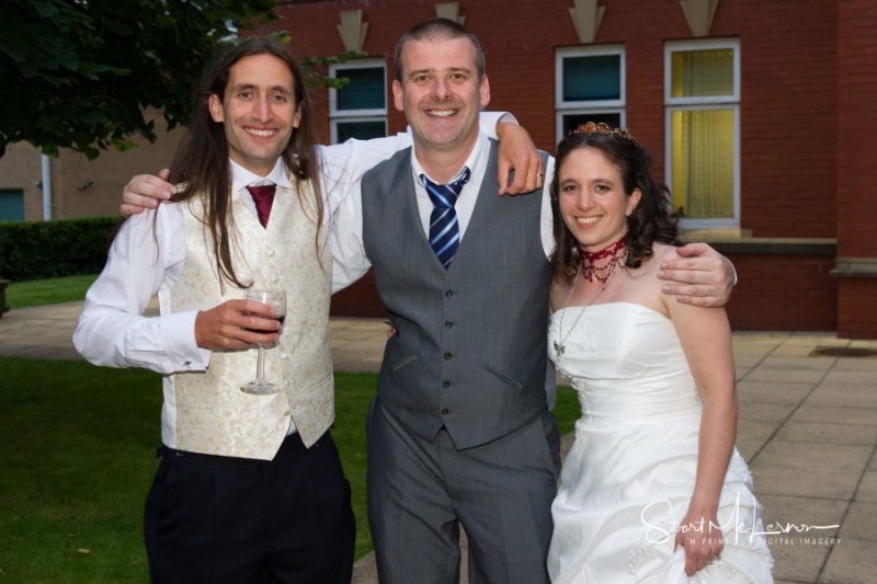 Posing with the wedding photographer at Cheadle House