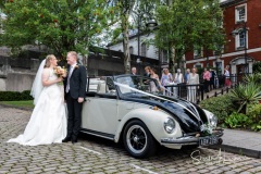 A portrait by the car