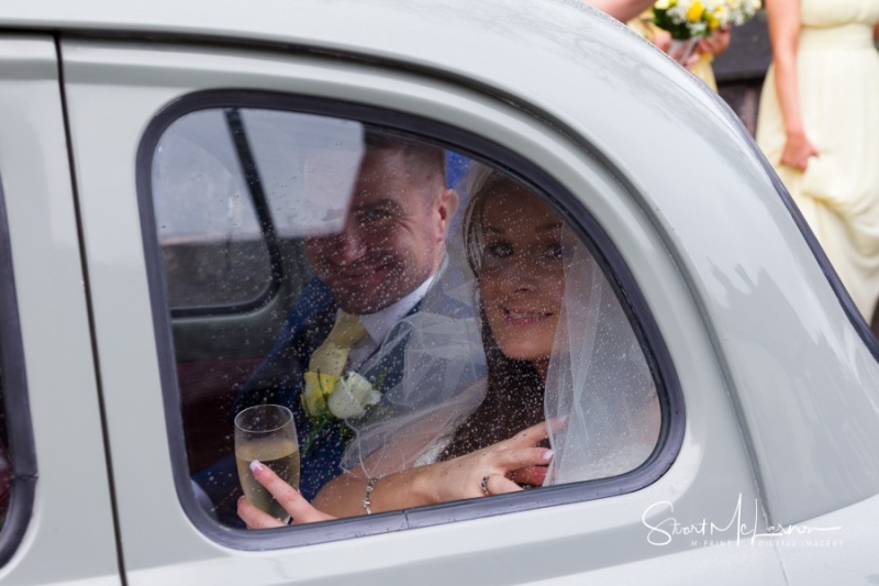 Bride and Groom in car