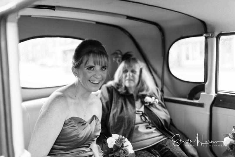 Bridesmaids in car