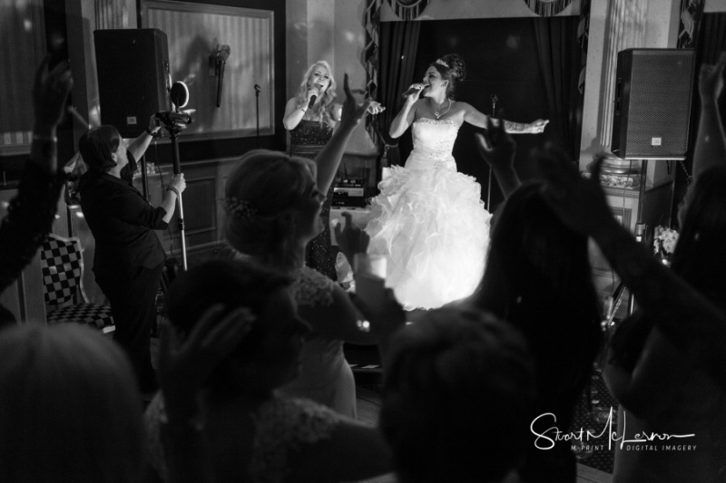 Bride serenading her husband