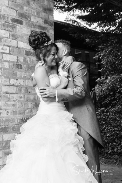 Whispering to his wife