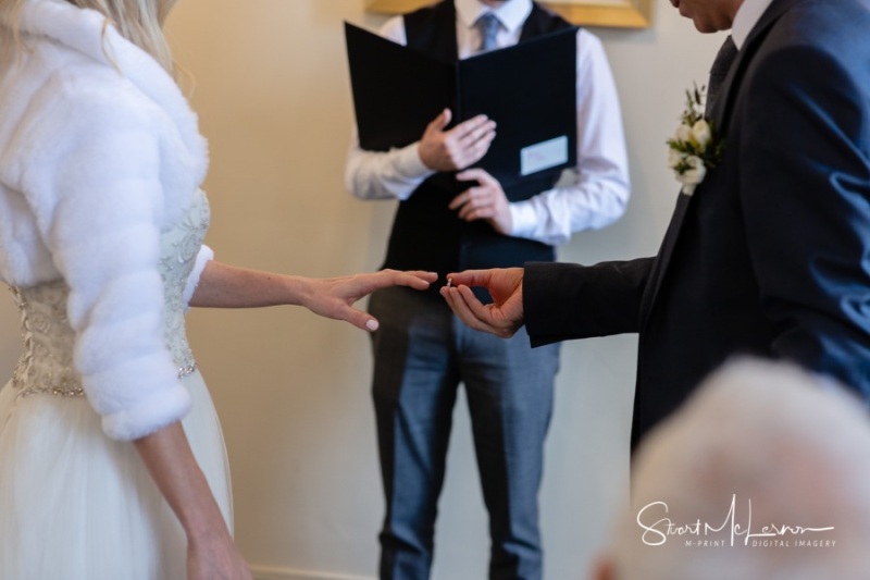 Placing the wedding ring at Stockport Town Hall