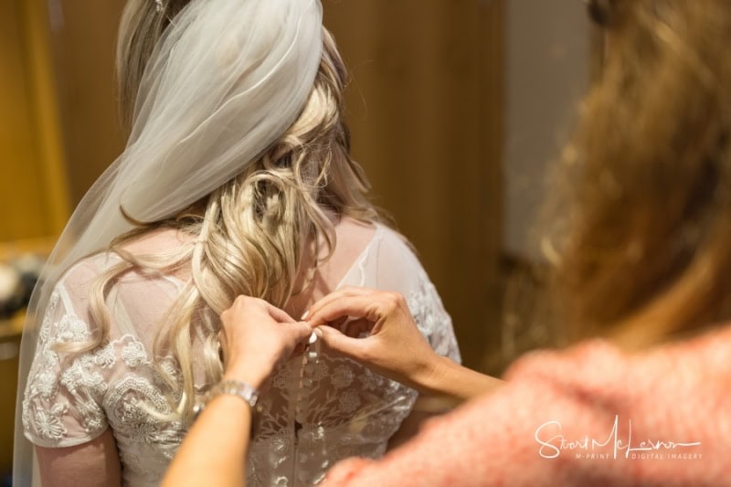 Fastening the dress