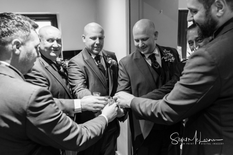 Groomsmen toasting