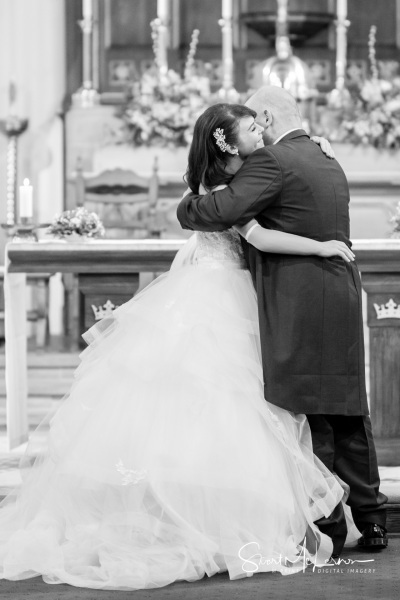 A hug at the altar