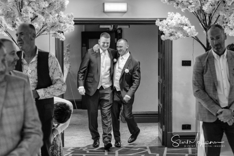 A proud groom and his son