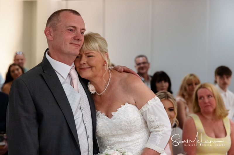 A cuddle during the ceremony