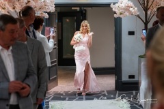 A smiling bridesmaid