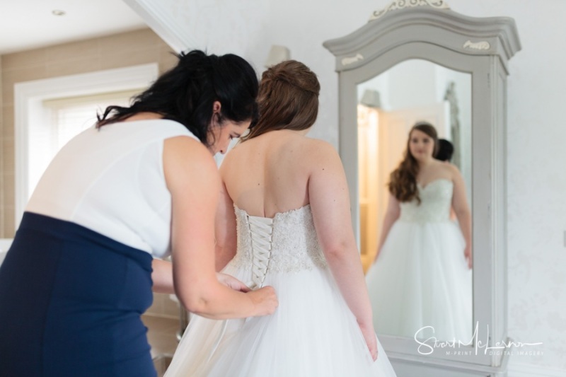 Fastening the dress