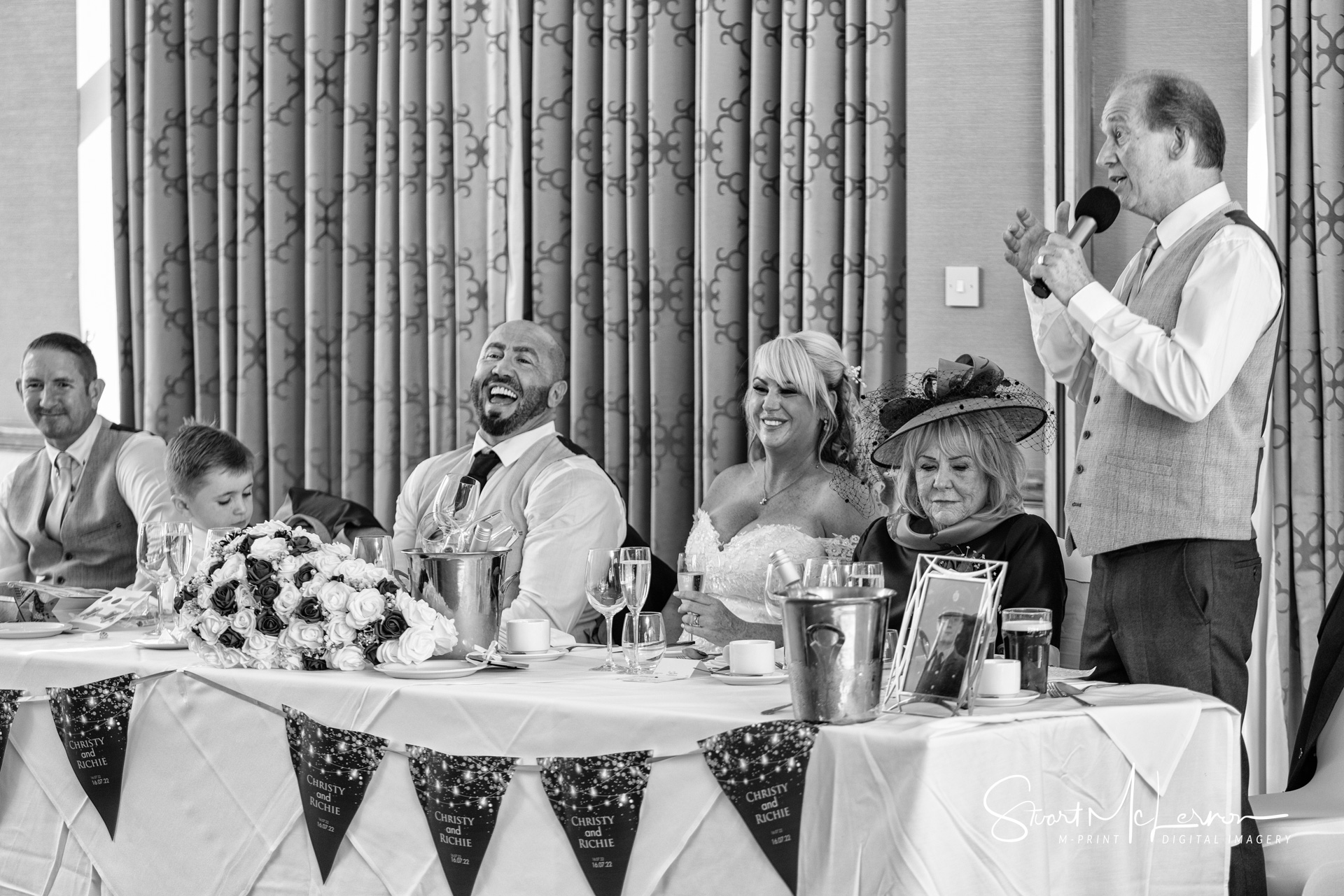 Laughter during wedding speech at The Craxton Wood Hotel